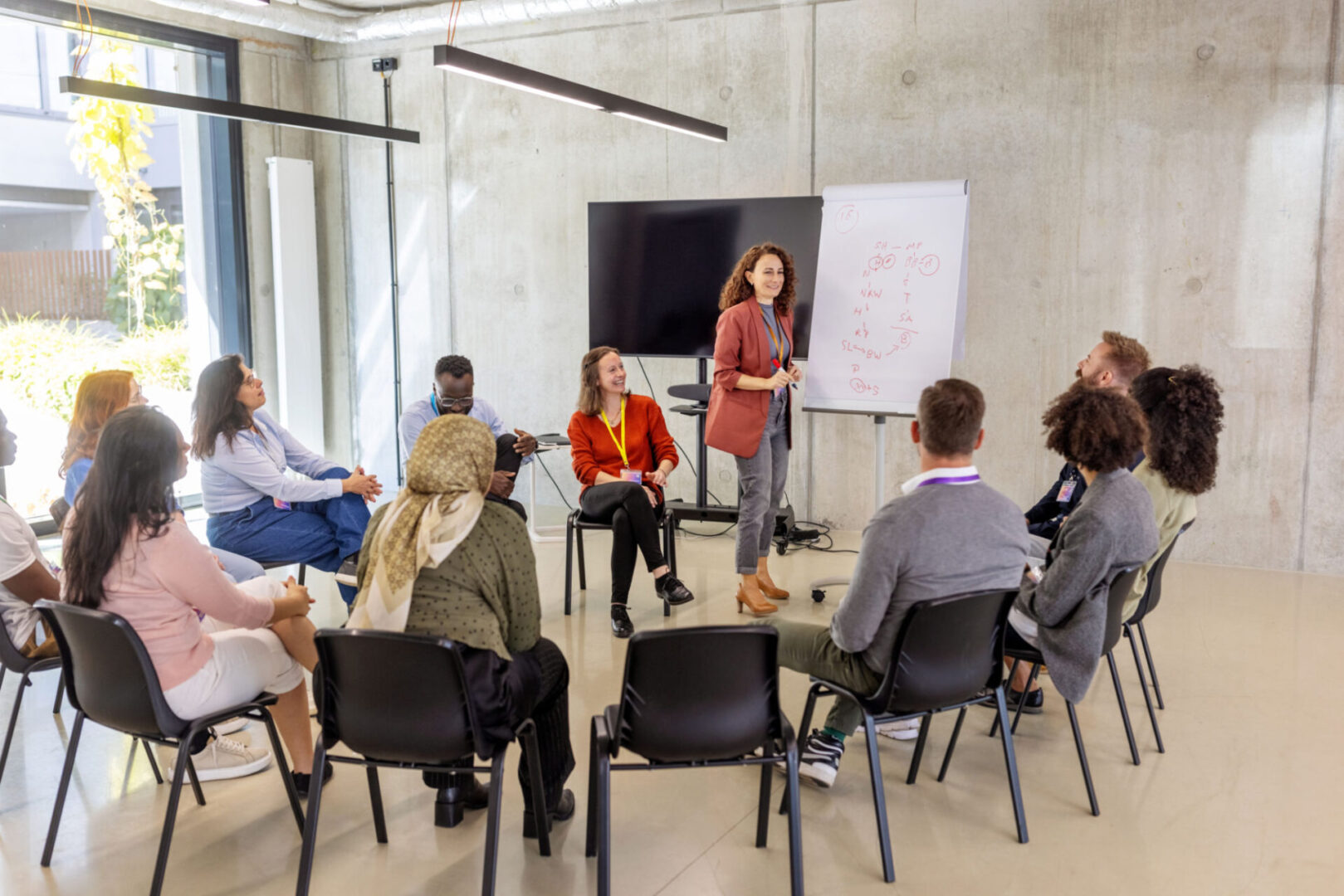 Group discussion in a modern meeting room.